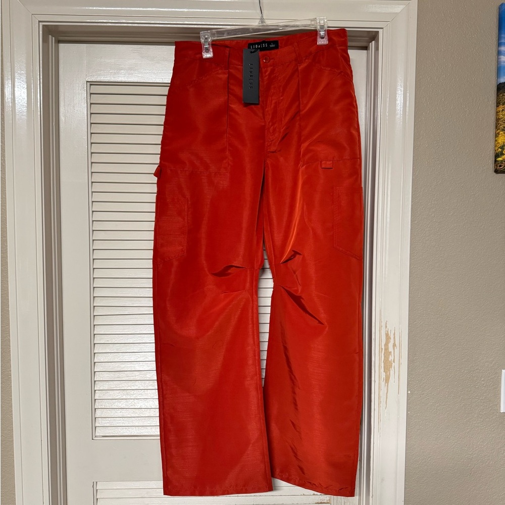 Lioness Miami Vice Red Cargo Pants with satin effect fabric.